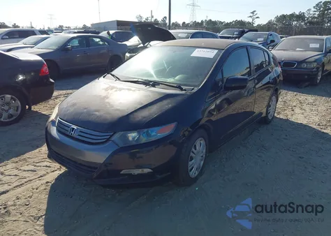 2011 Honda Insight from USA, damaged, VIN JHMZE2H36BS006488